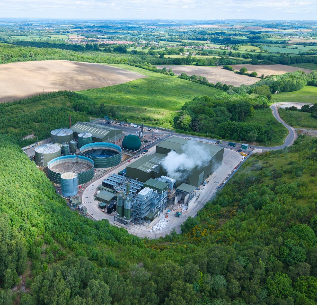 Aerial view of an anaerobic digestion plant set in woodland